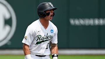 Wright State's Hunter Warren (12) reacts after hitting a double off Vanderbilt pitcher Austin Nye (40) during the first inning of the Nashville Regional NCAA Baseball Tournament elimination game at Hawkins Field Sunday, June 1, 2025, in Nashville, Tenn.