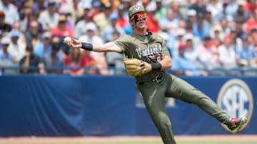 Vanderbilt Commodores' Brodie Johnston (9) throws the ball to first base as Ole Miss Rebels take on Vanderbilt Commodores during the SEC baseball tournament championship game at Hoover Met in Birmingham, Ala., on Sunday, May 25, 2025.