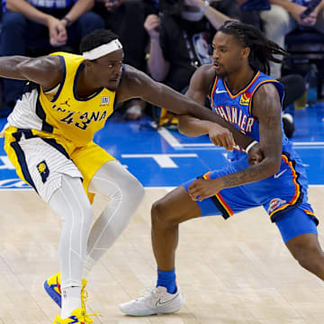 Jun 8, 2025; Oklahoma City, Oklahoma, USA; Indiana Pacers forward Pascal Siakam (43) looks to move the ball past Oklahoma City Thunder guard Cason Wallace (22) during the second quarter of game two of the 2025 NBA Finals at Paycom Center. Mandatory Credit: Alonzo Adams-Imagn Images