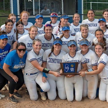 Donovan Catholic celebrate with their trophy. Donovan Catholic Softball defeats St. John Vianney in NJSIAA South Non-Public A section final in Toms River on June 5, 2025.