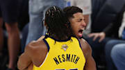 Indiana Pacers star Tyrese Haliburton hugs Aaron Nesmith after hitting a game-winning shot in the NBA Finals.