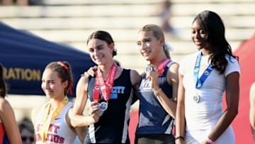 Jurupa Valley's AB Hernandez (second from the right) stands in the middle of two other competitors that share the 1st-place podium for the girls high jump at the CIF State track and field finals on Saturday, May 31, 2025 in Clovis, Calif.